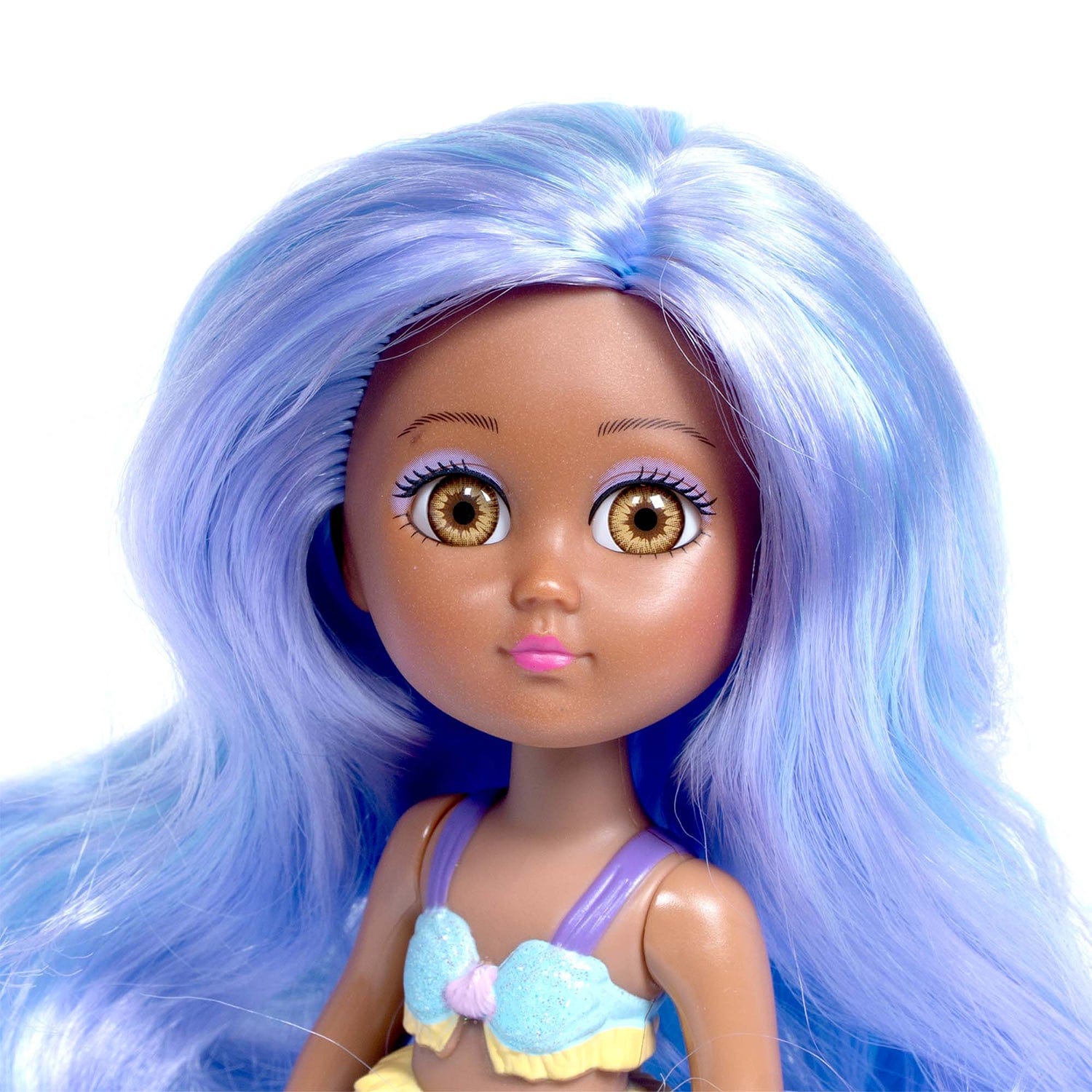 Water Wonder Oceana mermaid doll has light purple hair with blue highlights, a glittery blue bikini top, and yellow ruffle accents. Her beautiful mermaid doll tail changes from light blue to purple when she’s swimming in cold water. Ages 1+.