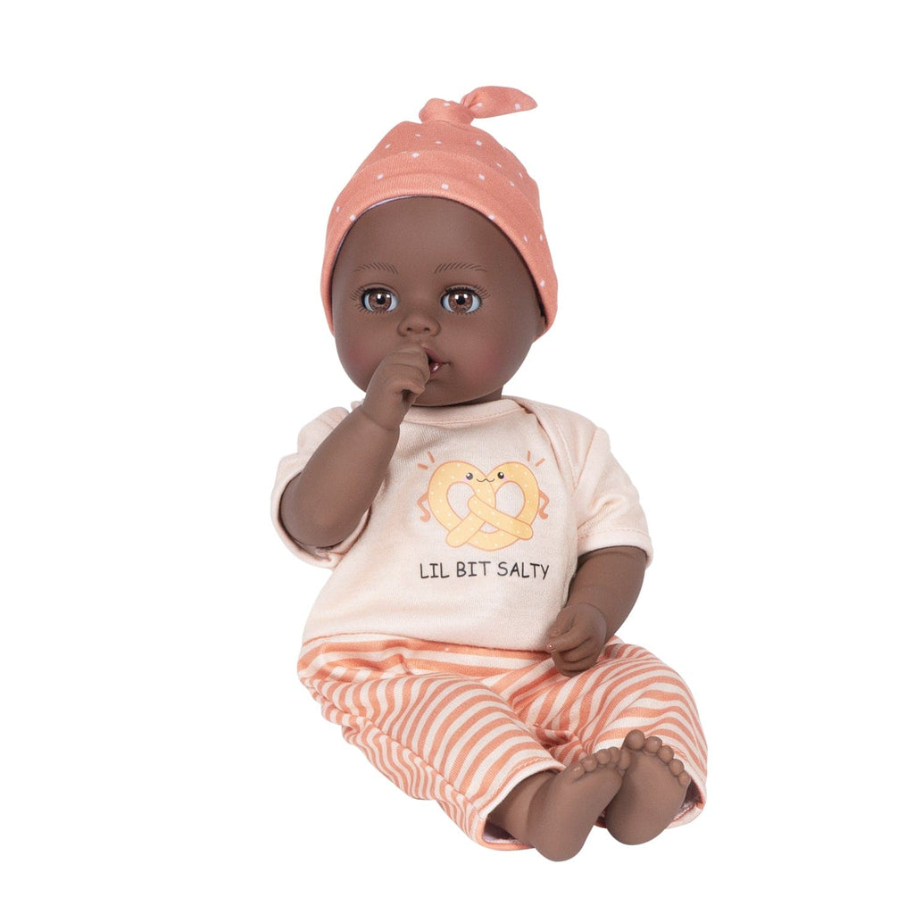 Adora Sweet Pretzel baby doll set includes one 13-inch African American doll, pretzel-printed shirt, pants, matching beanie, blue baby bottle.  Made for Ages 1+.