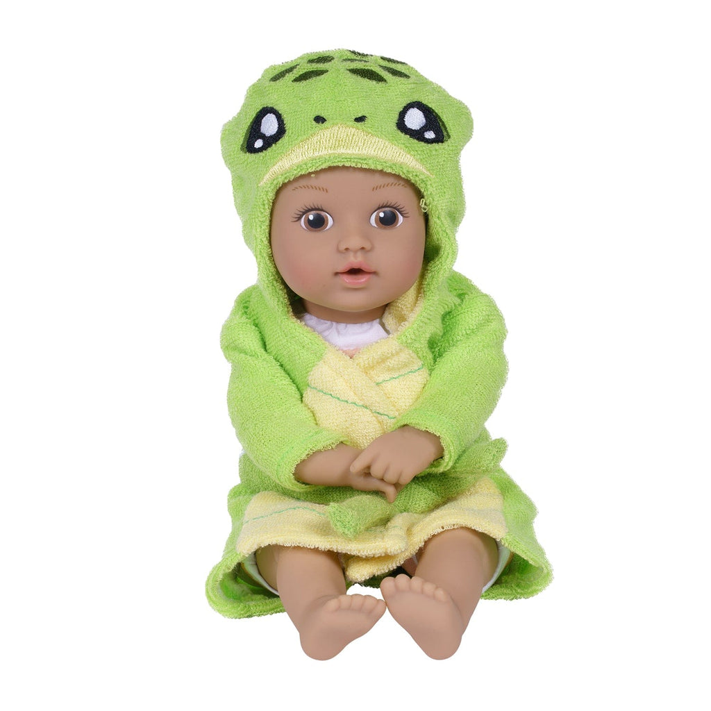 Adora BathTime baby doll set comes with one 8.5-inch baby doll boy, an attached sandy-colored sea turtle-print swimsuit, and an embroidered hooded Sea Turtle terry bathrobe complete with an embroidered face and green turtle shell on the back. 100% machine washable - made to love and last with Adora's exclusive Quick Dry fabric. 