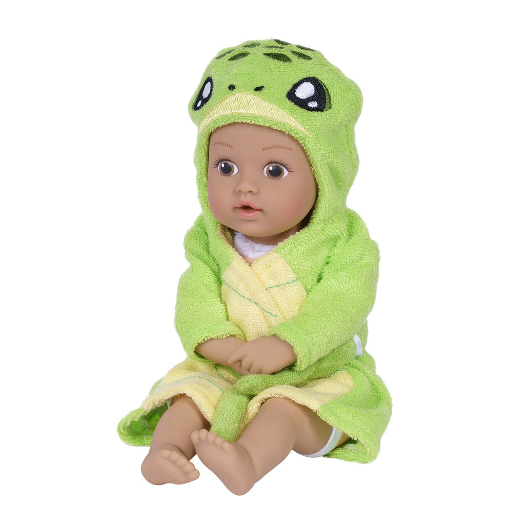 Adora BathTime baby doll set comes with one 8.5-inch baby doll boy, an attached sandy-colored sea turtle-print swimsuit, and an embroidered hooded Sea Turtle terry bathrobe complete with an embroidered face and green turtle shell on the back. 100% machine washable - made to love and last with Adora's exclusive Quick Dry fabric. 