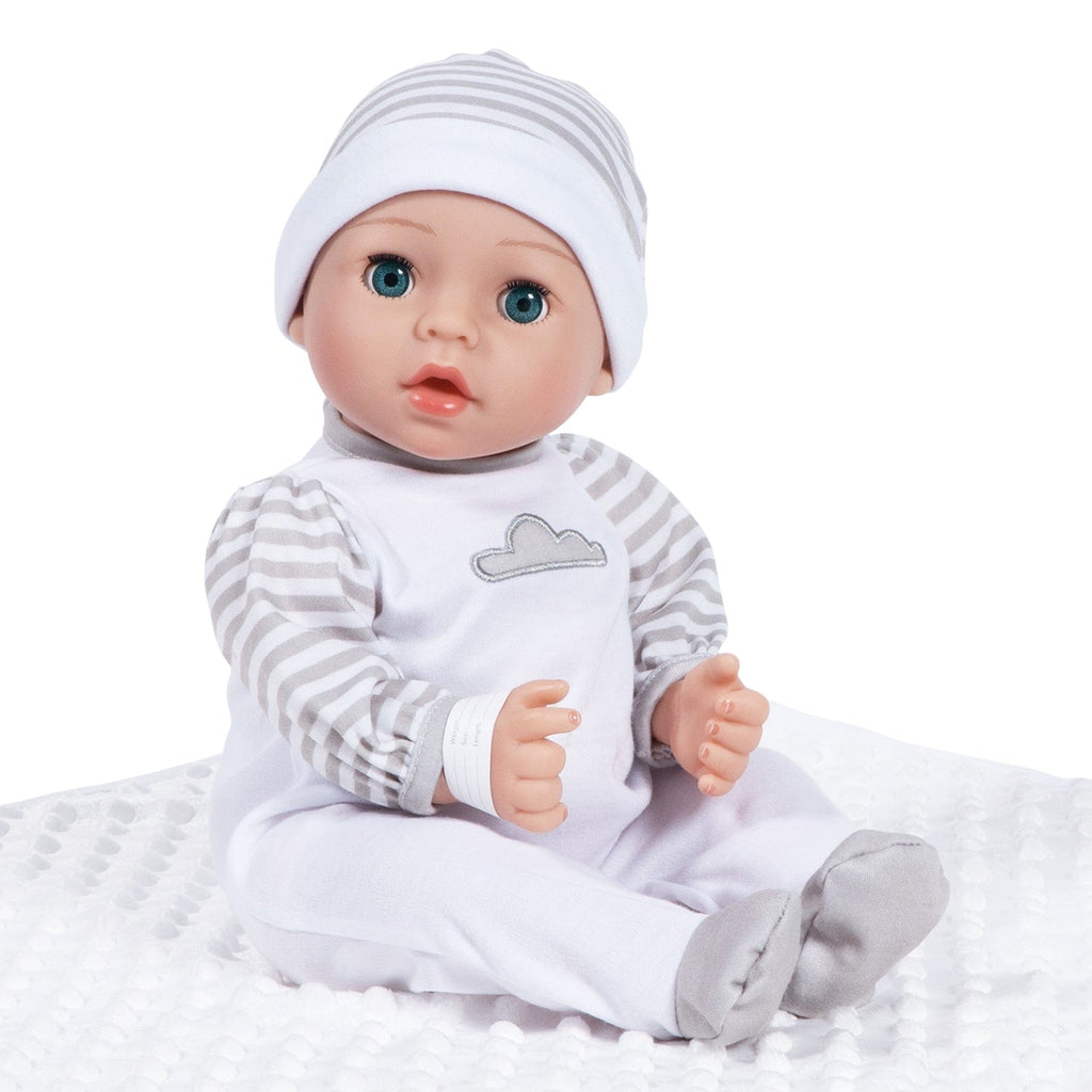 Gender-neutral baby doll set comes with one 16" weighted baby doll, a Certificate of Adoption, a pacifier, a hospital bracelet, a disposable diaper, a baby blanket, a crib, and a removable striped, cloud-print onesie with a matching cap.